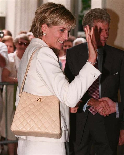 Inside Princess Diana’s iconic handbag collection .